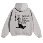 SHOOTING GUNS AND SPREADING BUNS Skull with Sexy Lady Unisex FallFreshness outfits men streetwear 80s 90s graphic tees cotton funny Hoodies men gifts - View 10
